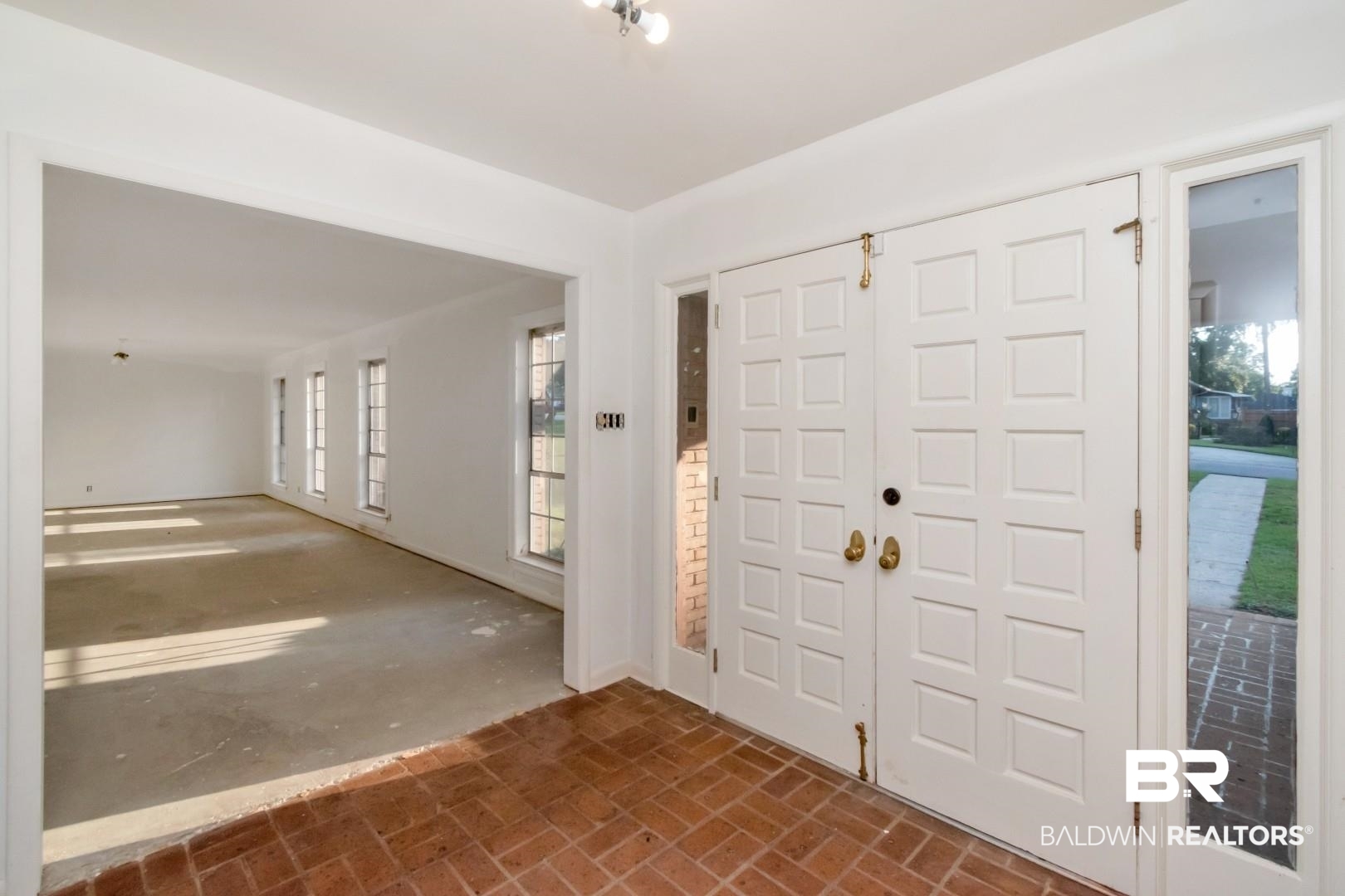 241 Suzanne Circle Mobile, AL 36608 - Photo 3 of 41 Foyer entrance with brick patterned flooring