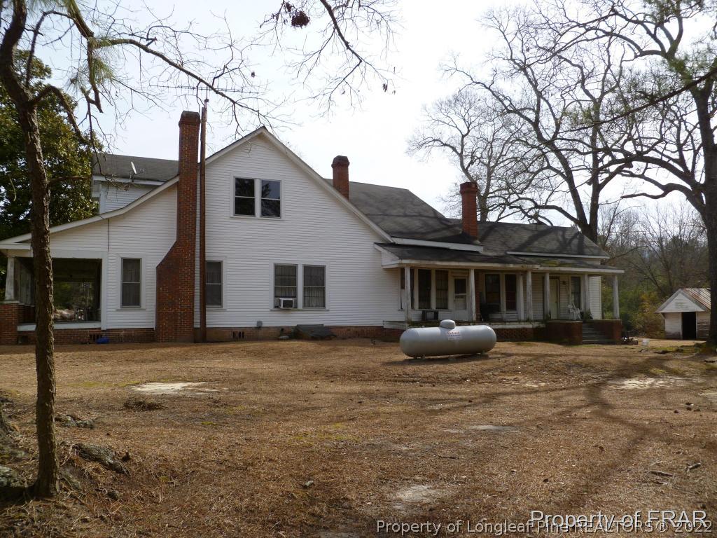 2861 Turnpike Road Raeford, NC 28376 - Photo 2 of 22 a front view of a house with patio