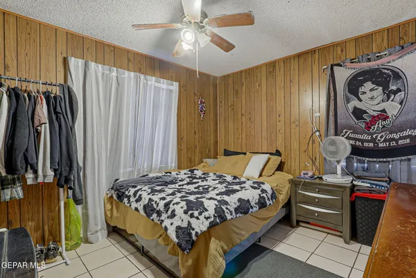a bedroom with a bed and a walk in closet
