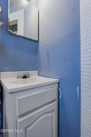 a utility room with a sink