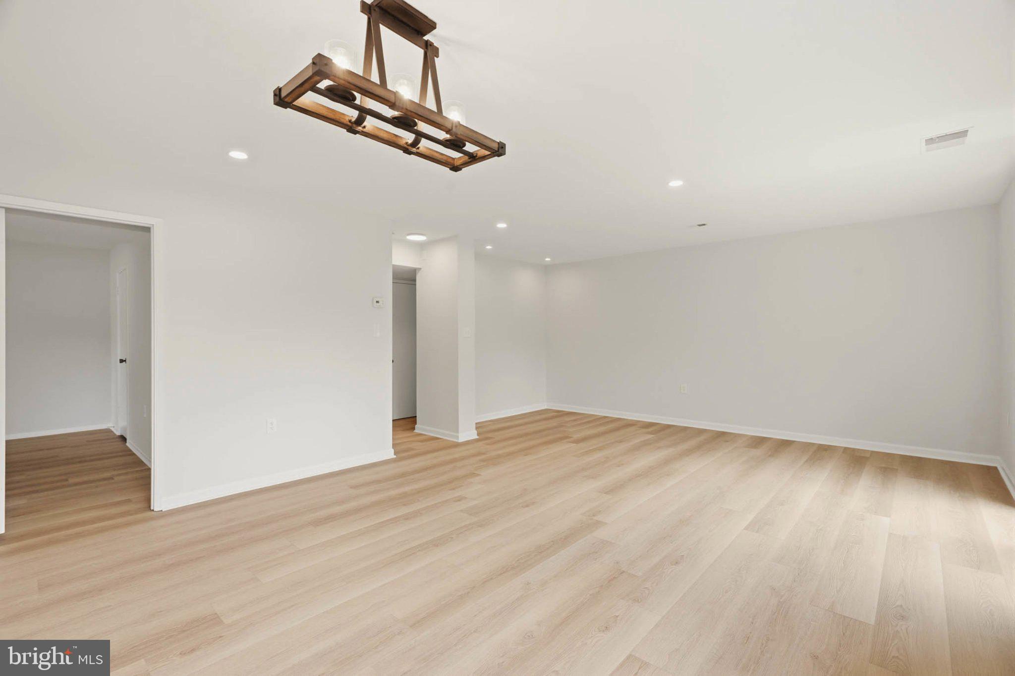 10901 Trotting Ridge Way, Unit 92 Columbia, MD 21044 - Photo 8 of 37 Spacious, light-filled living area.