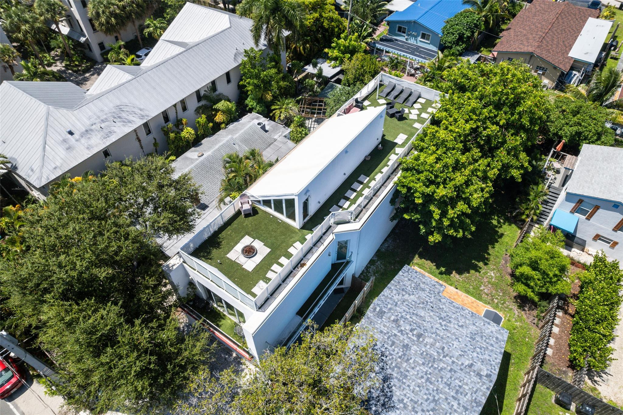 303 Southwest 9th Street Fort Lauderdale, FL 33315 - Photo 45 of 49 an aerial view of a house with a yard and potted plants