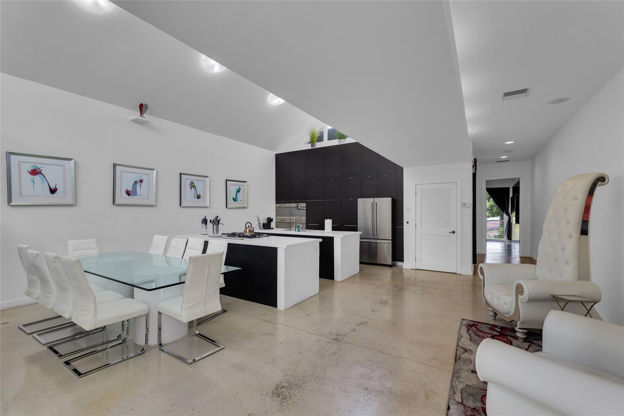 303 Southwest 9th Street Fort Lauderdale, FL 33315 - Photo 6 of 49 a living room with furniture and kitchen view