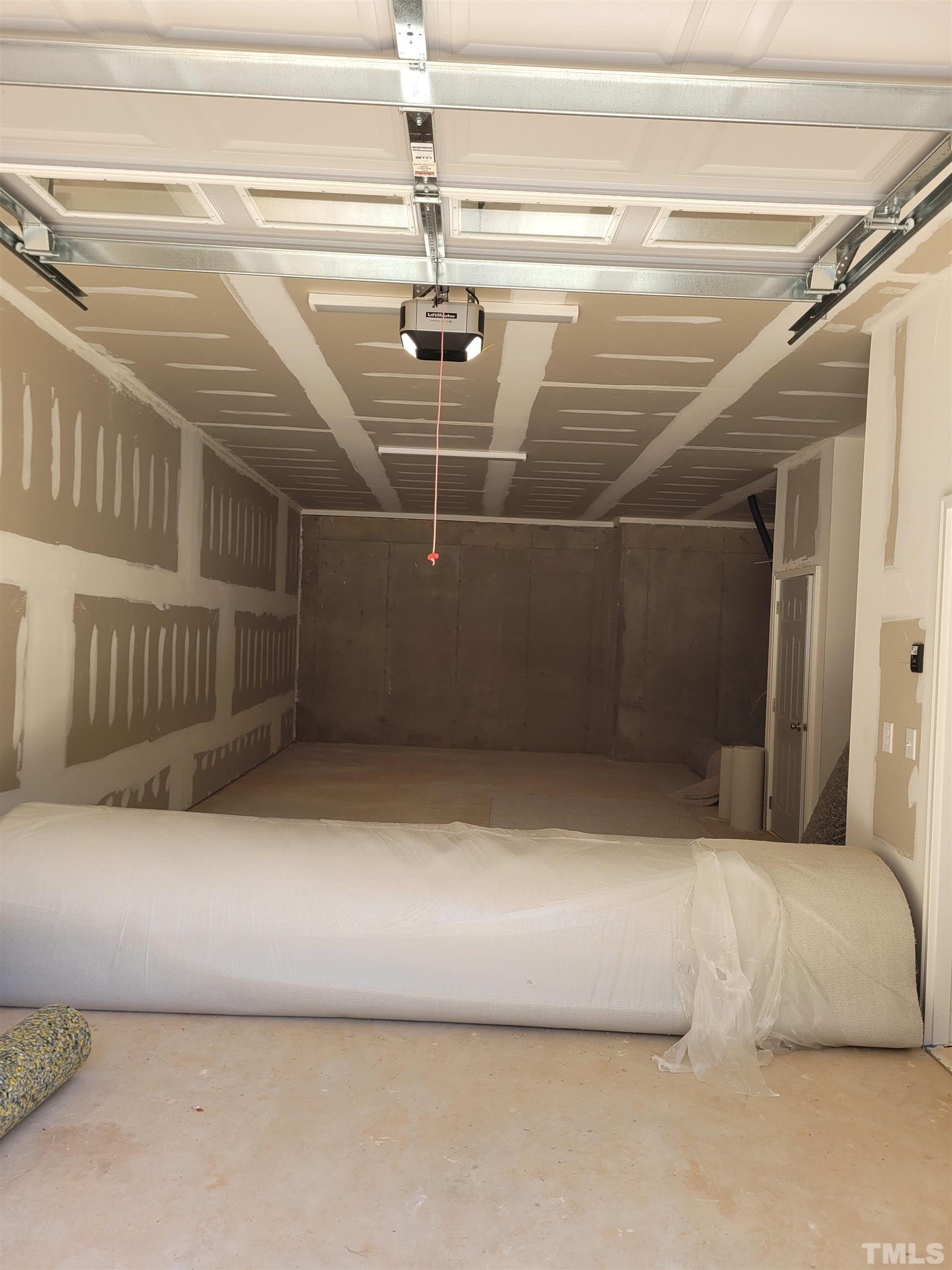 806 Laurel Gate Drive Wake Forest, NC 27587 - Photo 12 of 19 a view of a room with wooden floor
