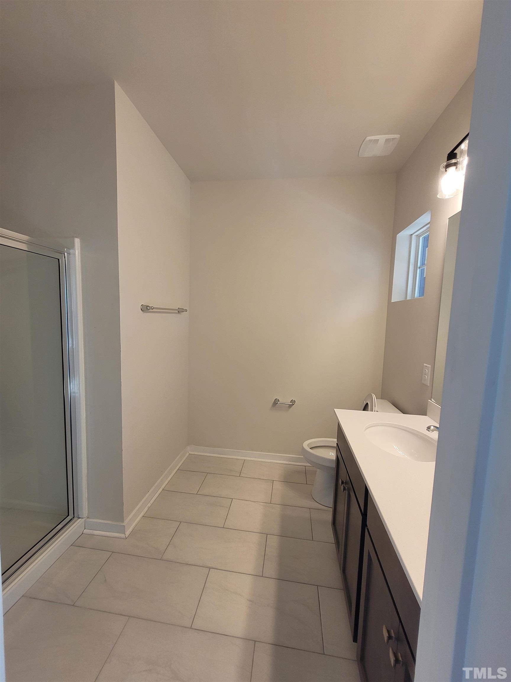 806 Laurel Gate Drive Wake Forest, NC 27587 - Photo 16 of 19 a utility room with a sink dryer and washer