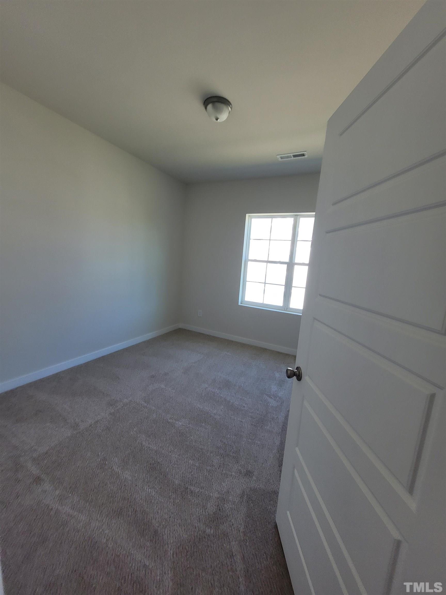 806 Laurel Gate Drive Wake Forest, NC 27587 - Photo 19 of 19 a view of room and window