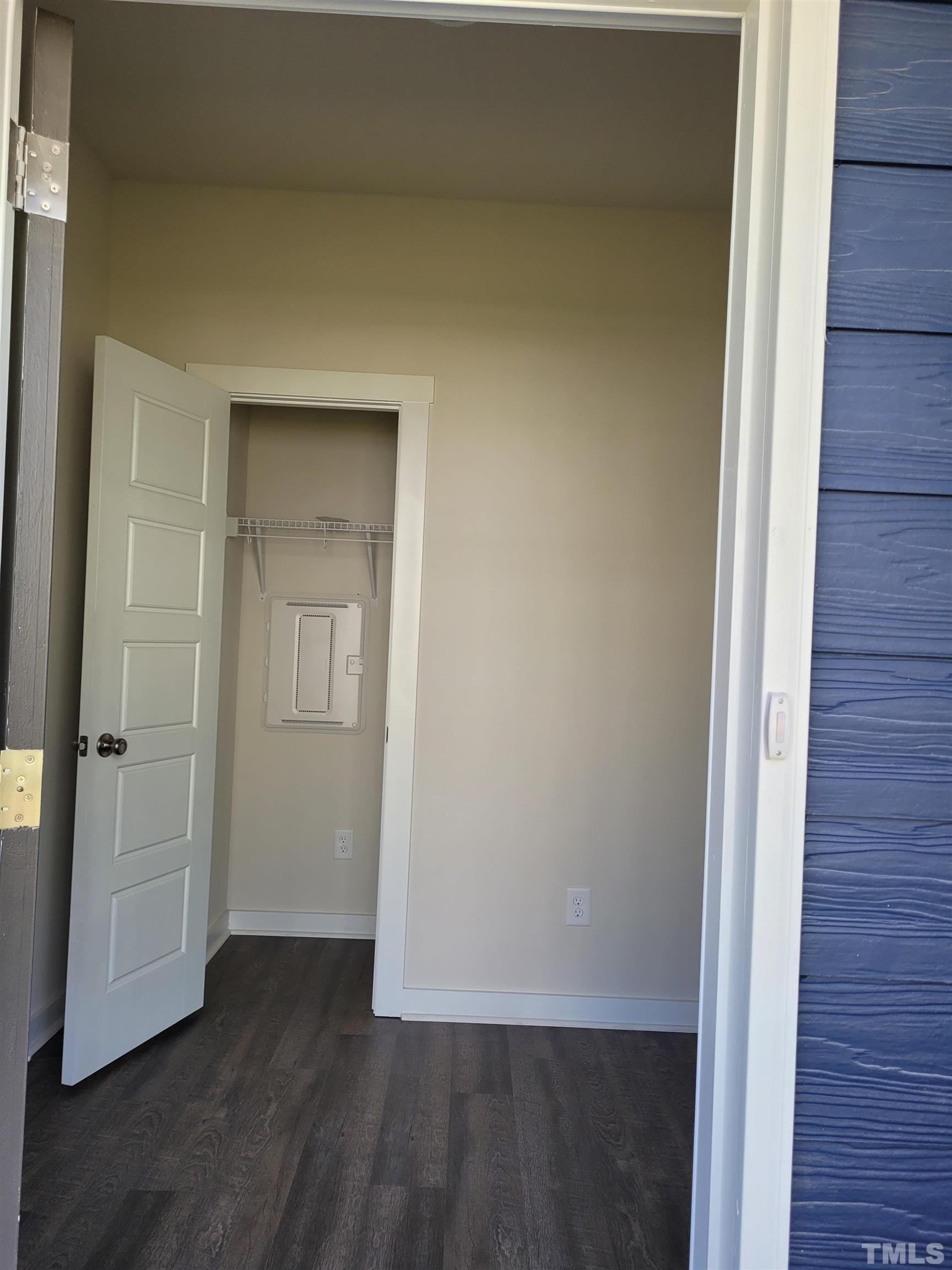 806 Laurel Gate Drive Wake Forest, NC 27587 - Photo 2 of 19 a view of an empty room with closet and wooden floor