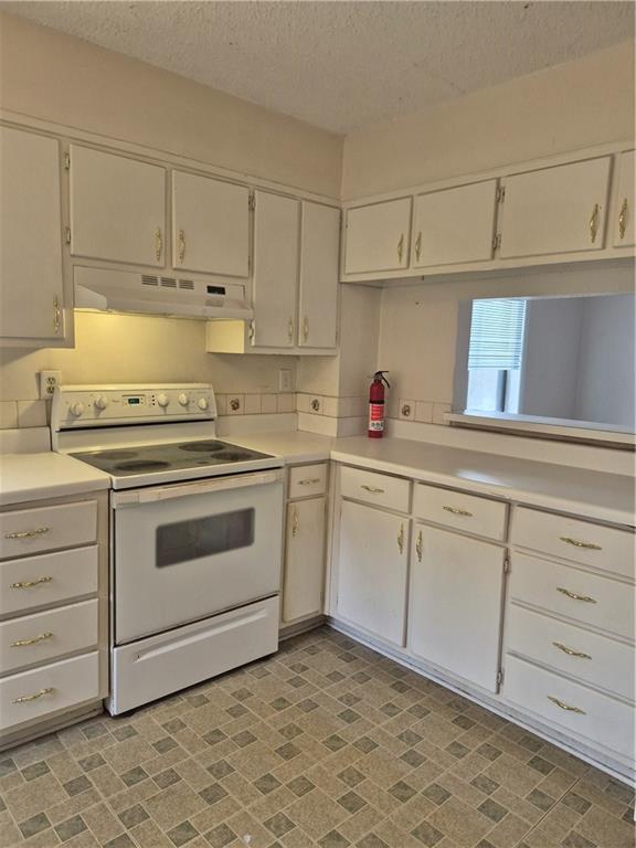 7 Quail Run Decatur, GA 30035 - Photo 6 of 16 a kitchen with cabinets appliances a sink and a stove