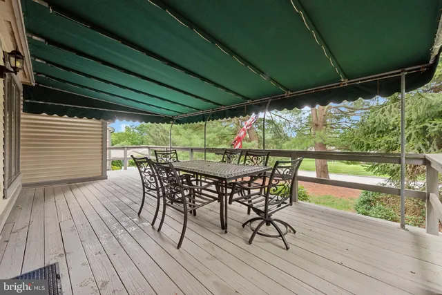 a view of outdoor space with furniture