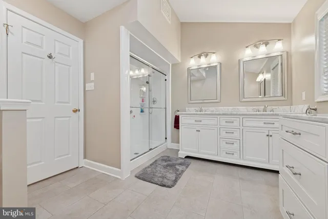 a view of cabinets and a chandelier