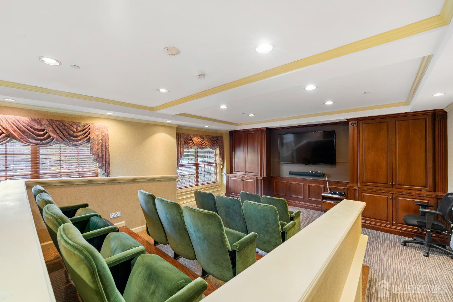 540 Cranbury Road East Brunswick, NJ 08816 - Photo 25 of 33 a living room with furniture a flat screen tv and a large window