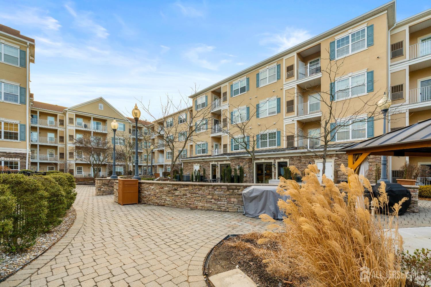 540 Cranbury Road East Brunswick, NJ 08816 - Photo 26 of 33 a view of a large building and a yard