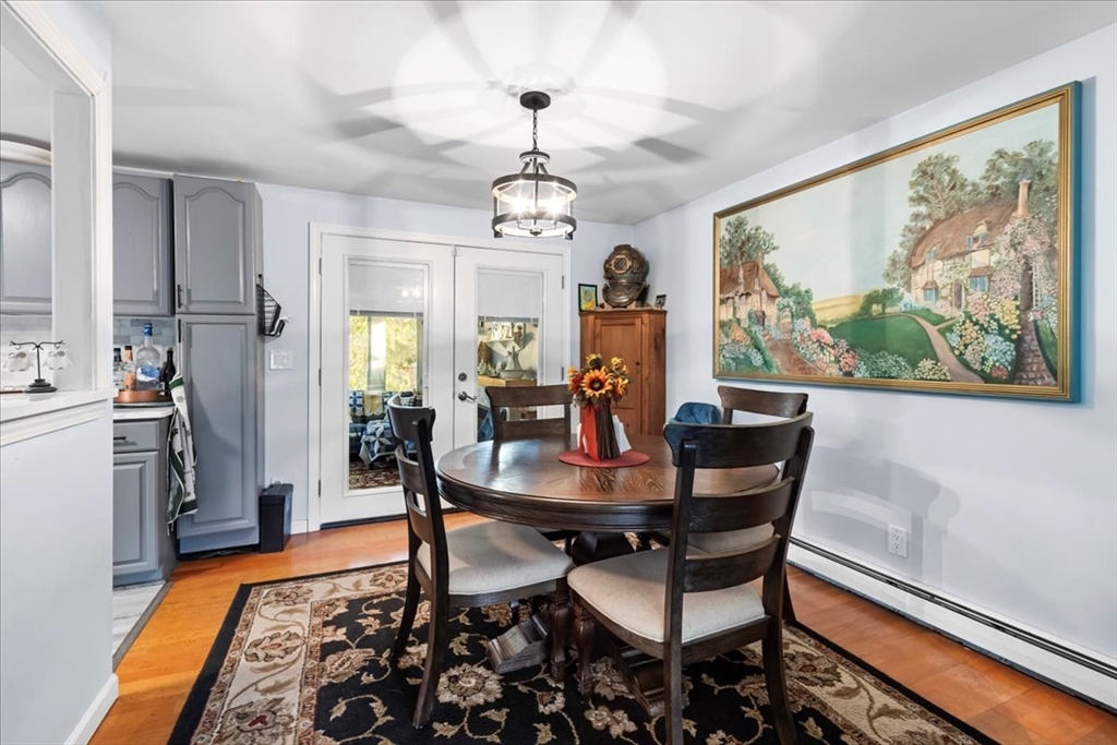 107 Ann Street Raynham, MA 02767 - Photo 12 of 34 a view of a dining room with furniture window and wooden floor