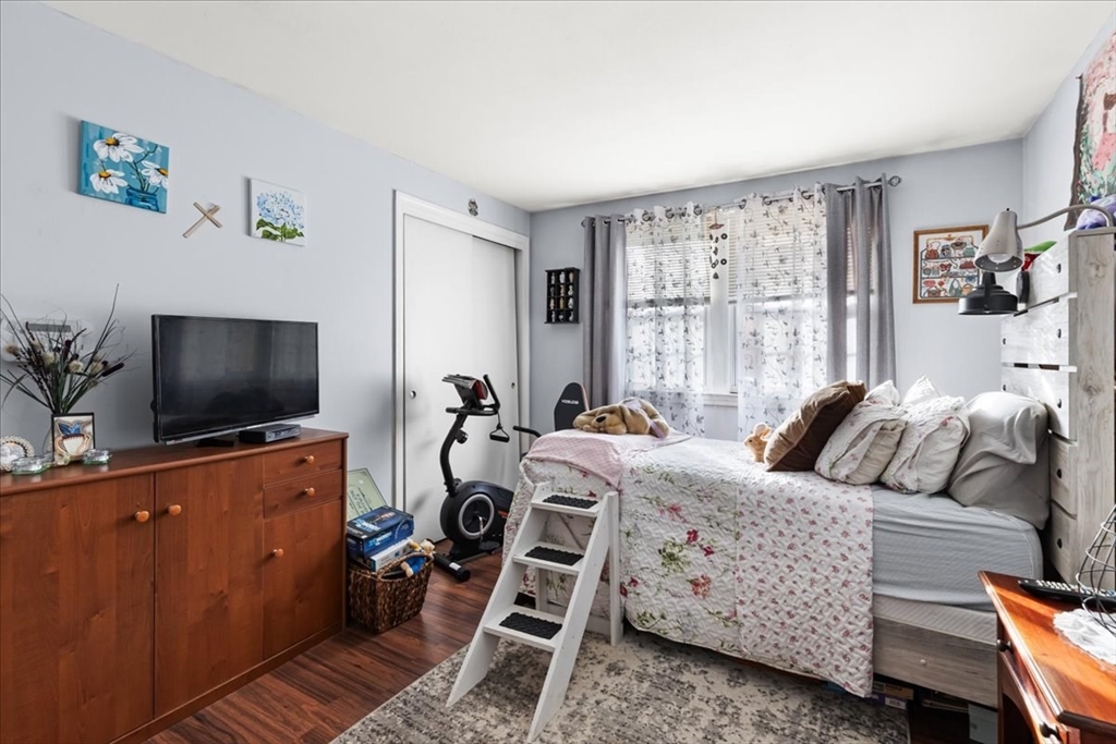 107 Ann Street Raynham, MA 02767 - Photo 22 of 34 a bedroom with furniture and a flat screen tv
