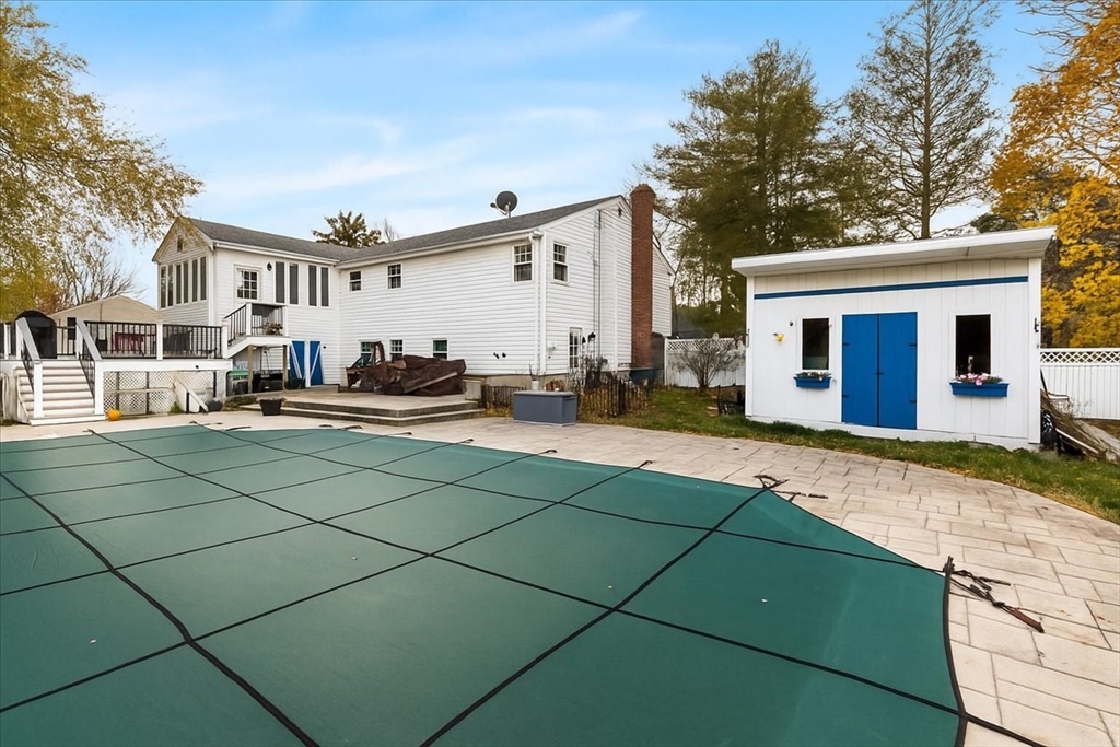 107 Ann Street Raynham, MA 02767 - Photo 4 of 34 a front view of a house with a patio