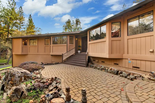 a house view with a backyard