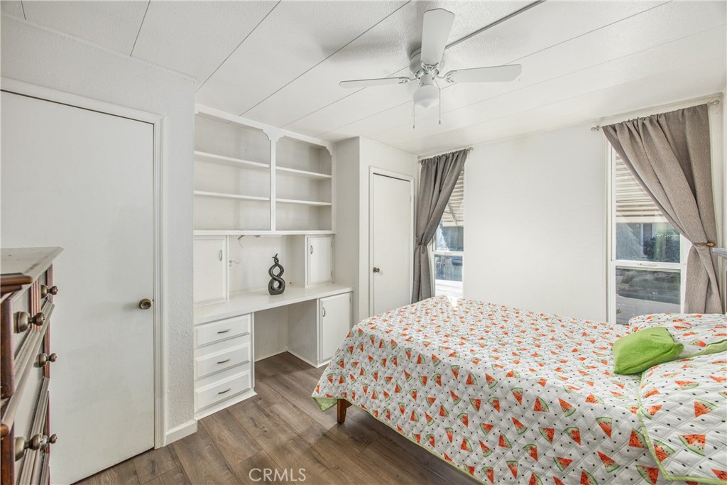 626 North Dearborn Street, Unit 56 Redlands, CA 92374 - Photo 22 of 30 a bedroom with a bed and a window