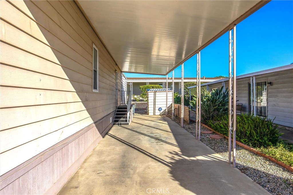 626 North Dearborn Street, Unit 56 Redlands, CA 92374 - Photo 24 of 30 a view of house with wooden floor and wooden fence
