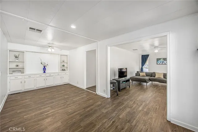a view of a living room and dining room