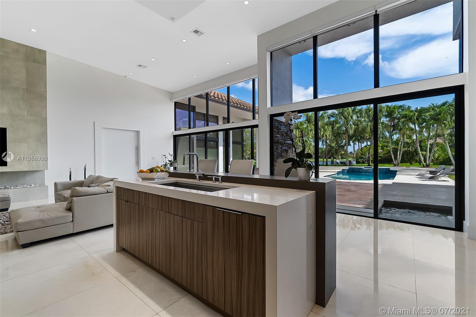 2850 Windmill Ranch Road Weston, FL 33331 - Photo 14 of 50 a kitchen with stainless steel appliances granite countertop a stove and a refrigerator