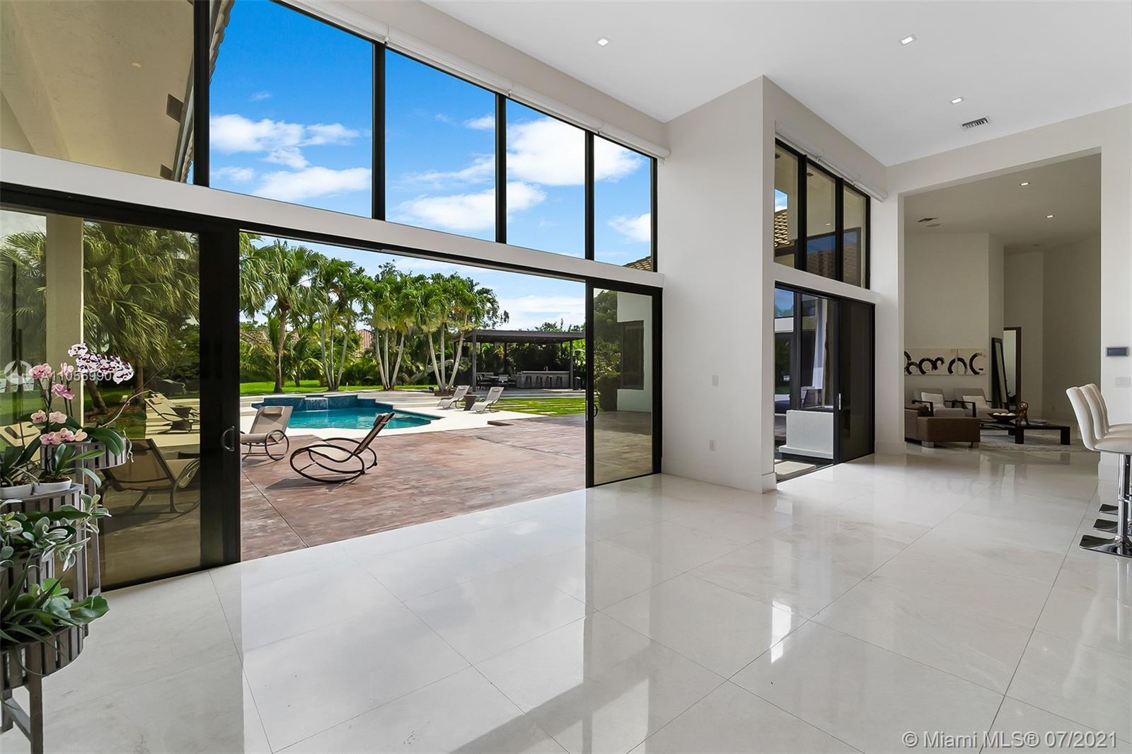 2850 Windmill Ranch Road Weston, FL 33331 - Photo 17 of 50 a view of a porch with seating space