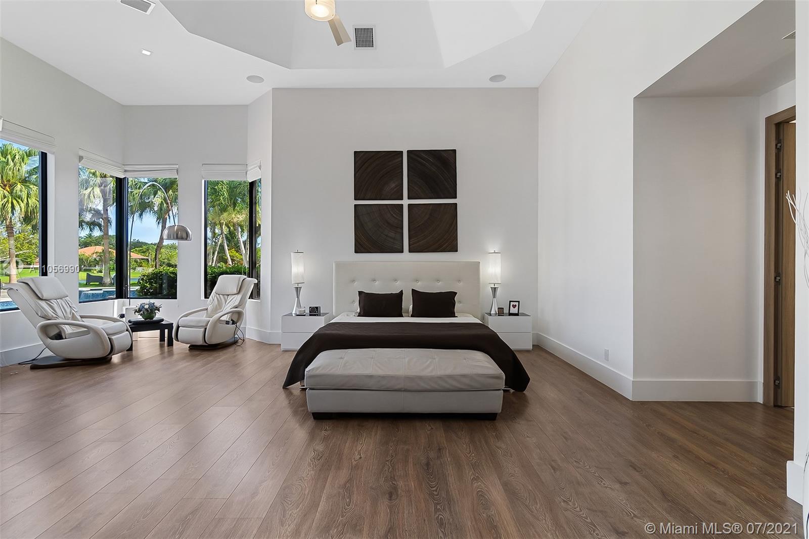 2850 Windmill Ranch Road Weston, FL 33331 - Photo 20 of 50 a bedroom with furniture and a large window