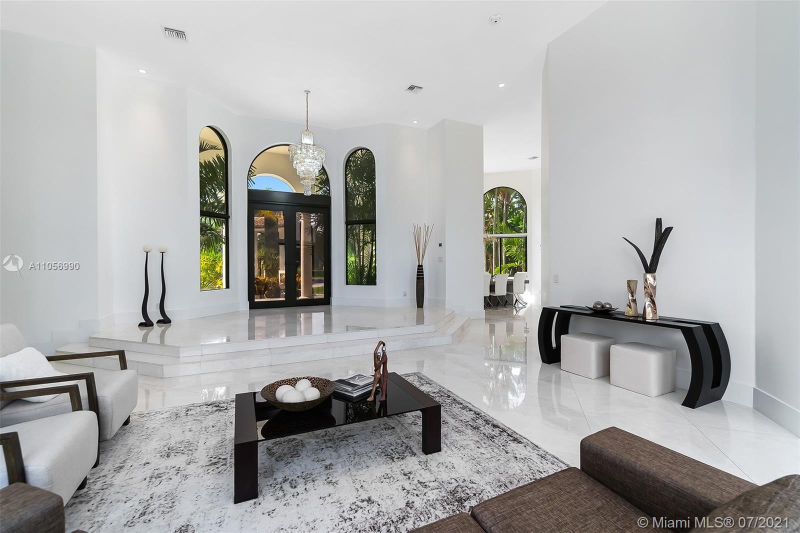 2850 Windmill Ranch Road Weston, FL 33331 - Photo 3 of 50 a living room with furniture rug and wooden floor