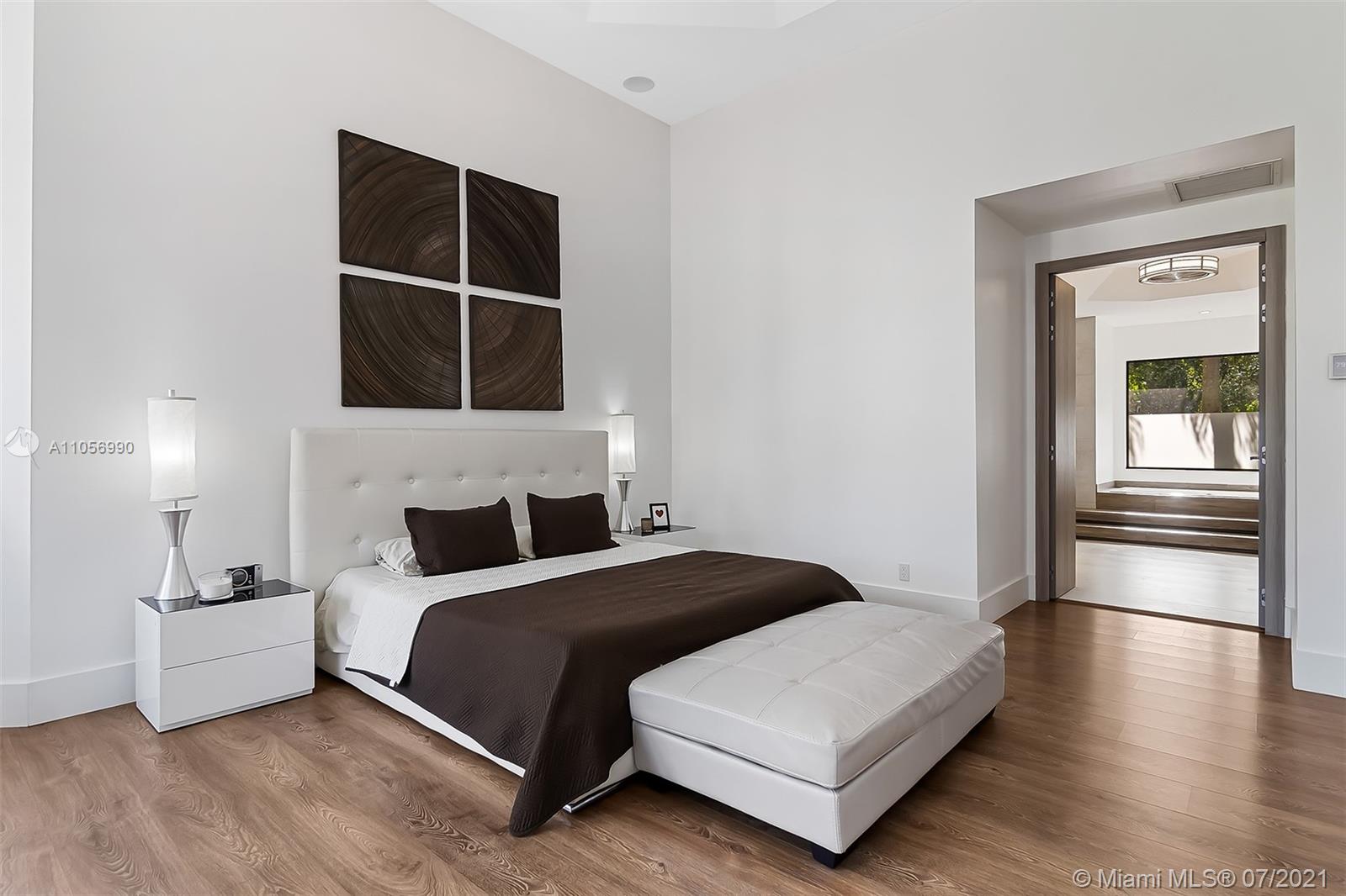 2850 Windmill Ranch Road Weston, FL 33331 - Photo 22 of 50 a bedroom with a bed and a window