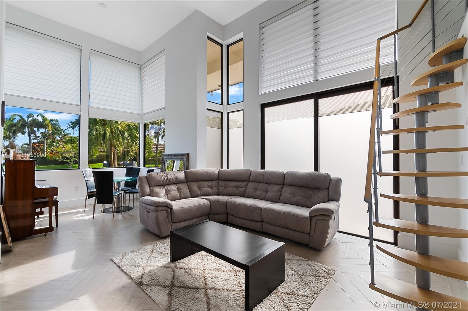 2850 Windmill Ranch Road Weston, FL 33331 - Photo 32 of 50 a living room with furniture and a large window