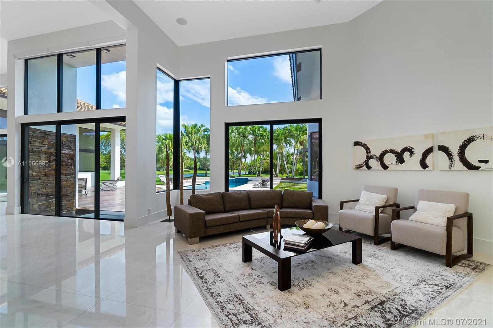 2850 Windmill Ranch Road Weston, FL 33331 - Photo 5 of 50 a living room with furniture and a large window