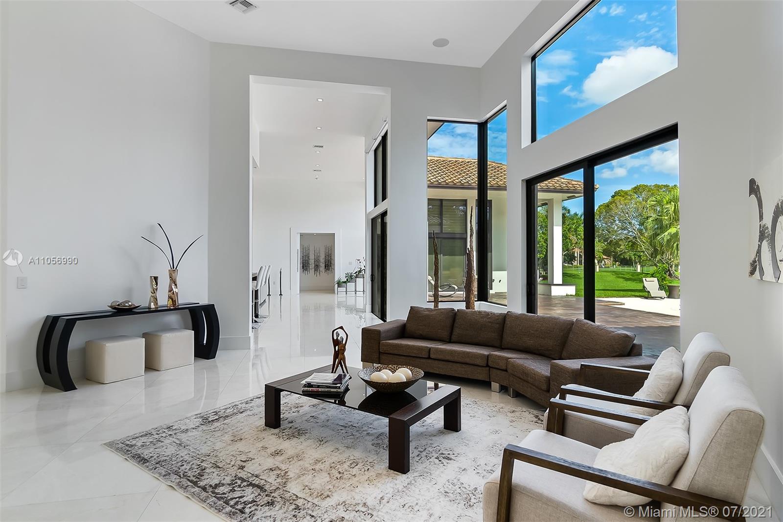 2850 Windmill Ranch Road Weston, FL 33331 - Photo 6 of 50 a living room with furniture and a large window