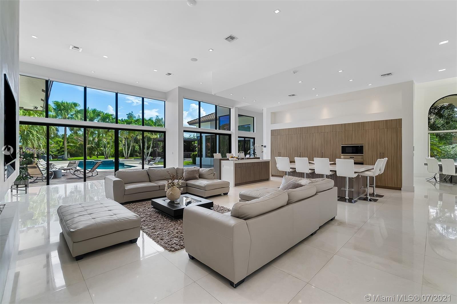2850 Windmill Ranch Road Weston, FL 33331 - Photo 8 of 50 a living room with furniture and large windows