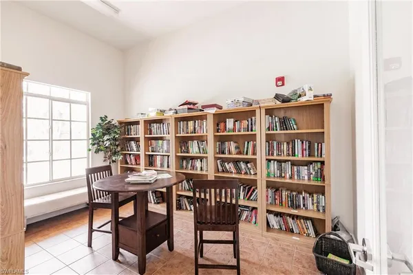 a view of a workspace with furniture