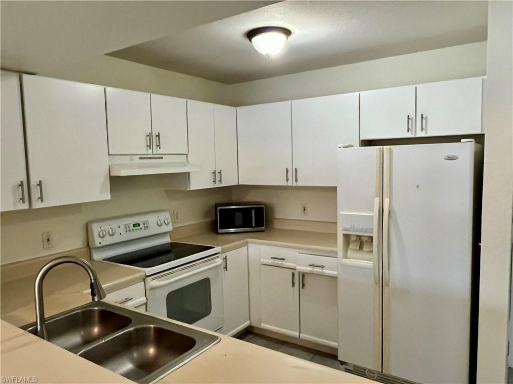 8224 Key Royal Circle, Unit 211 Naples, FL 34119 - Photo 3 of 21