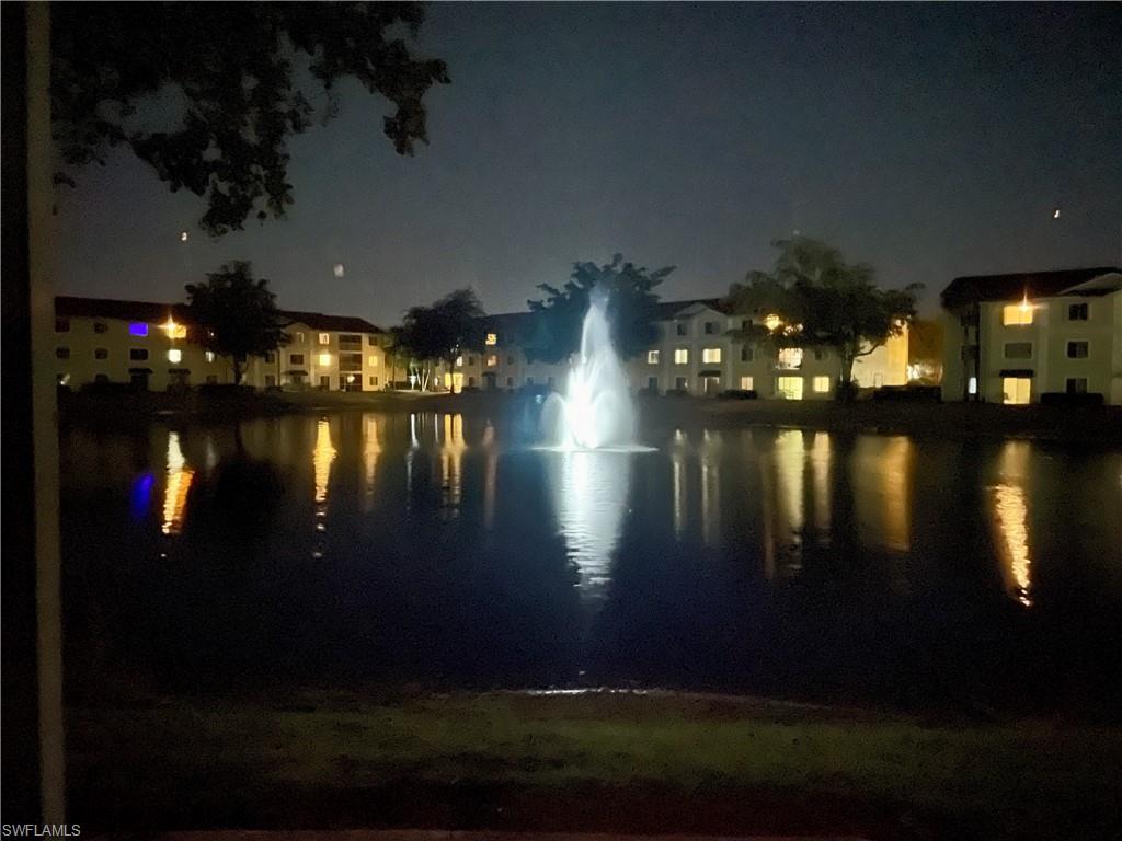 8224 Key Royal Circle, Unit 211 Naples, FL 34119 - Photo 10 of 25 a view of a yard in front of the house