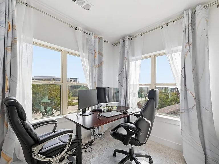 6844 Verandah Way Irving, TX 75039 - Photo 15 of 24 a view of a workspace with furniture and a window
