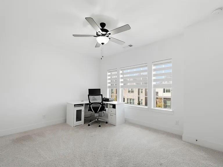 6844 Verandah Way Irving, TX 75039 - Photo 17 of 24 a view of a workspace with furniture and a window