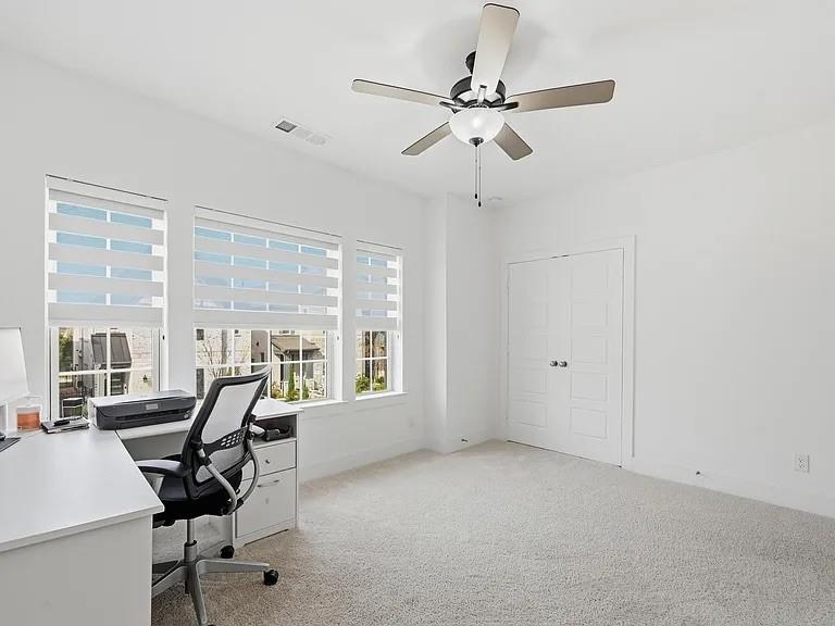 6844 Verandah Way Irving, TX 75039 - Photo 18 of 24 a view of a workspace with furniture and a window