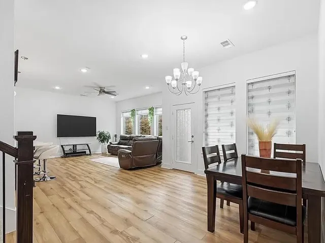 a view of a dining room with furniture