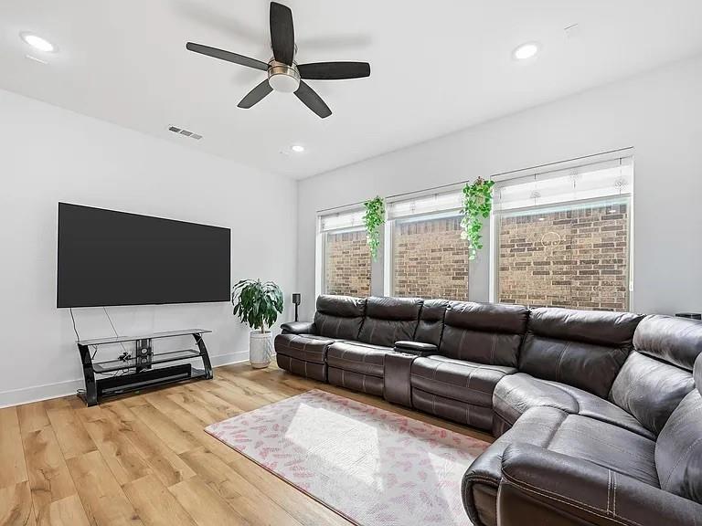 6844 Verandah Way Irving, TX 75039 - Photo 9 of 24 a living room with furniture and a flat screen tv