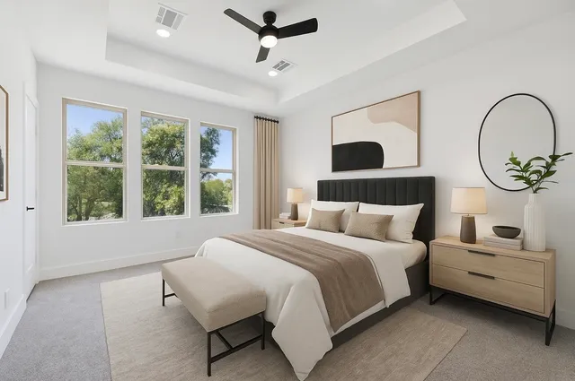 a bathroom with a granite countertop sink a toilet and shower
