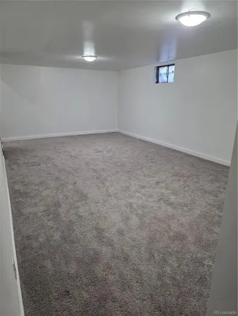 a bathroom with a toilet and a sink