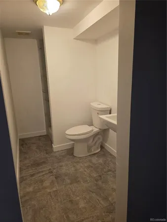 a view of a patio with table and chairs potted plants with wooden floor