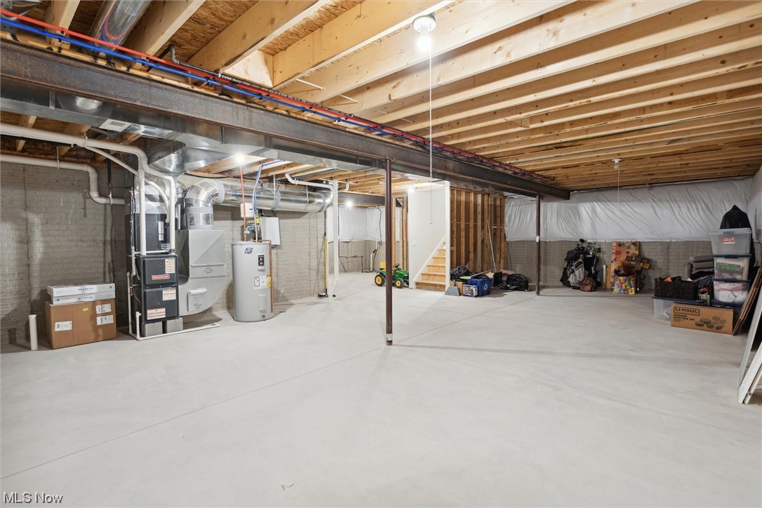256 Stone Ridge Way Berea, OH 44017 - Photo 29 of 32 Basement with heating utilities and electric water heater