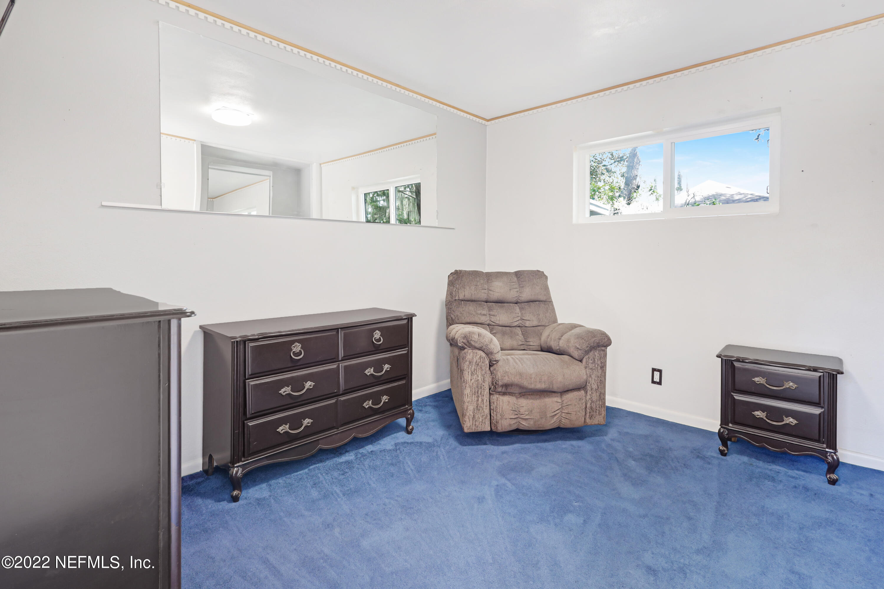 3955 Heidi Road Jacksonville, FL 32277 - Photo 26 of 43 a living room with furniture and a couch