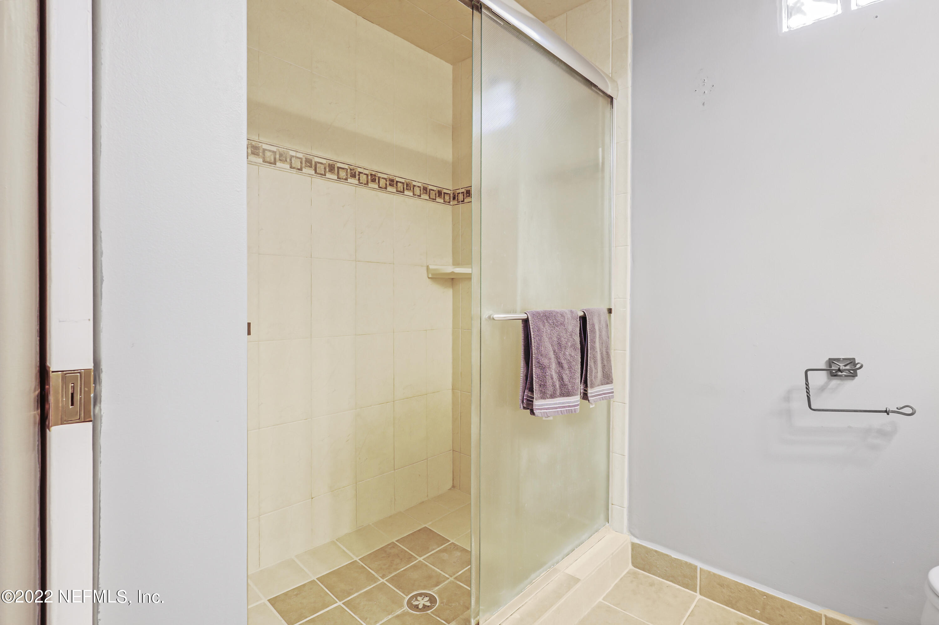 3955 Heidi Road Jacksonville, FL 32277 - Photo 32 of 43 a bathroom with a shower