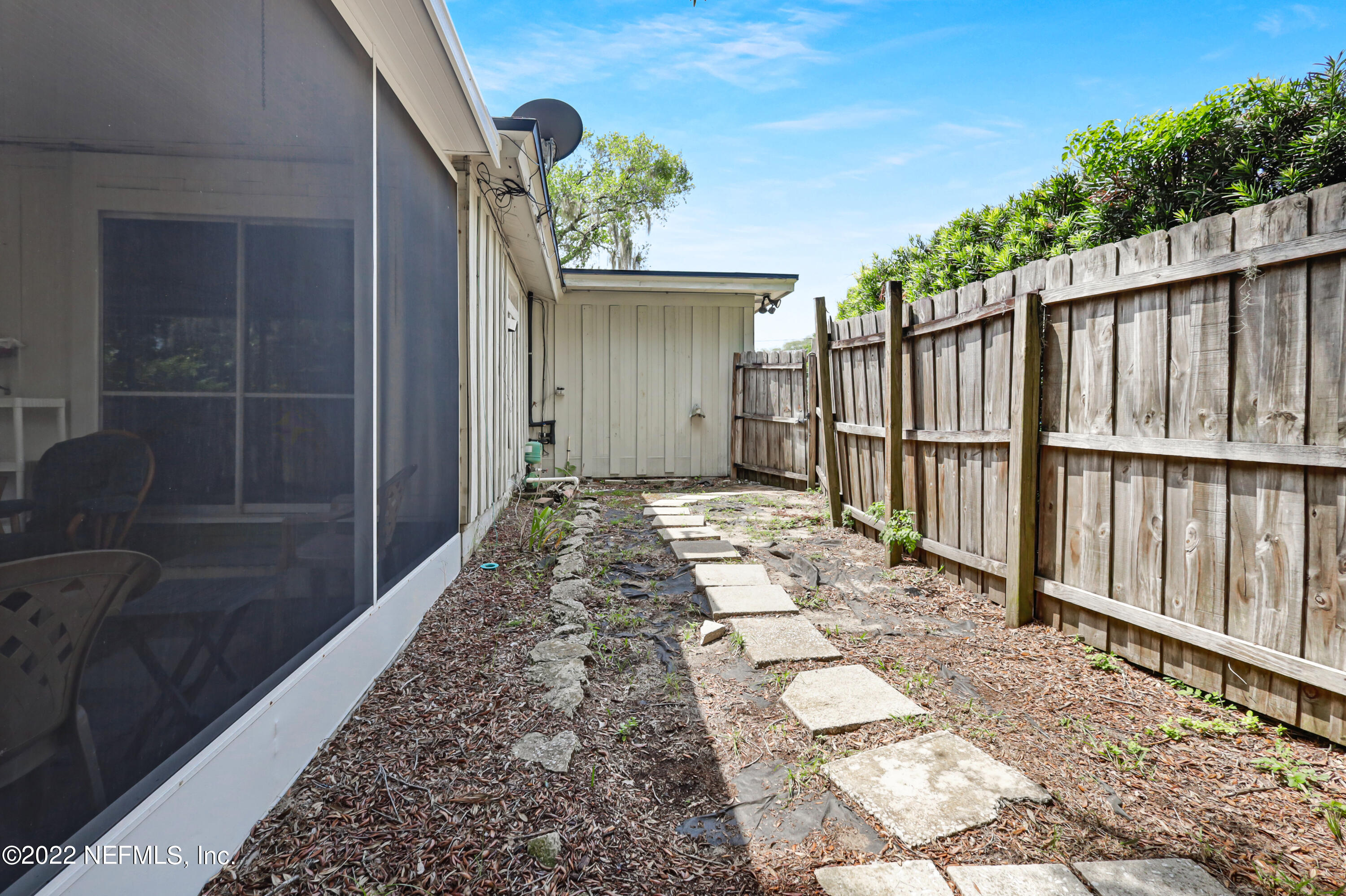 3955 Heidi Road Jacksonville, FL 32277 - Photo 36 of 43 a view of a house with a backyard