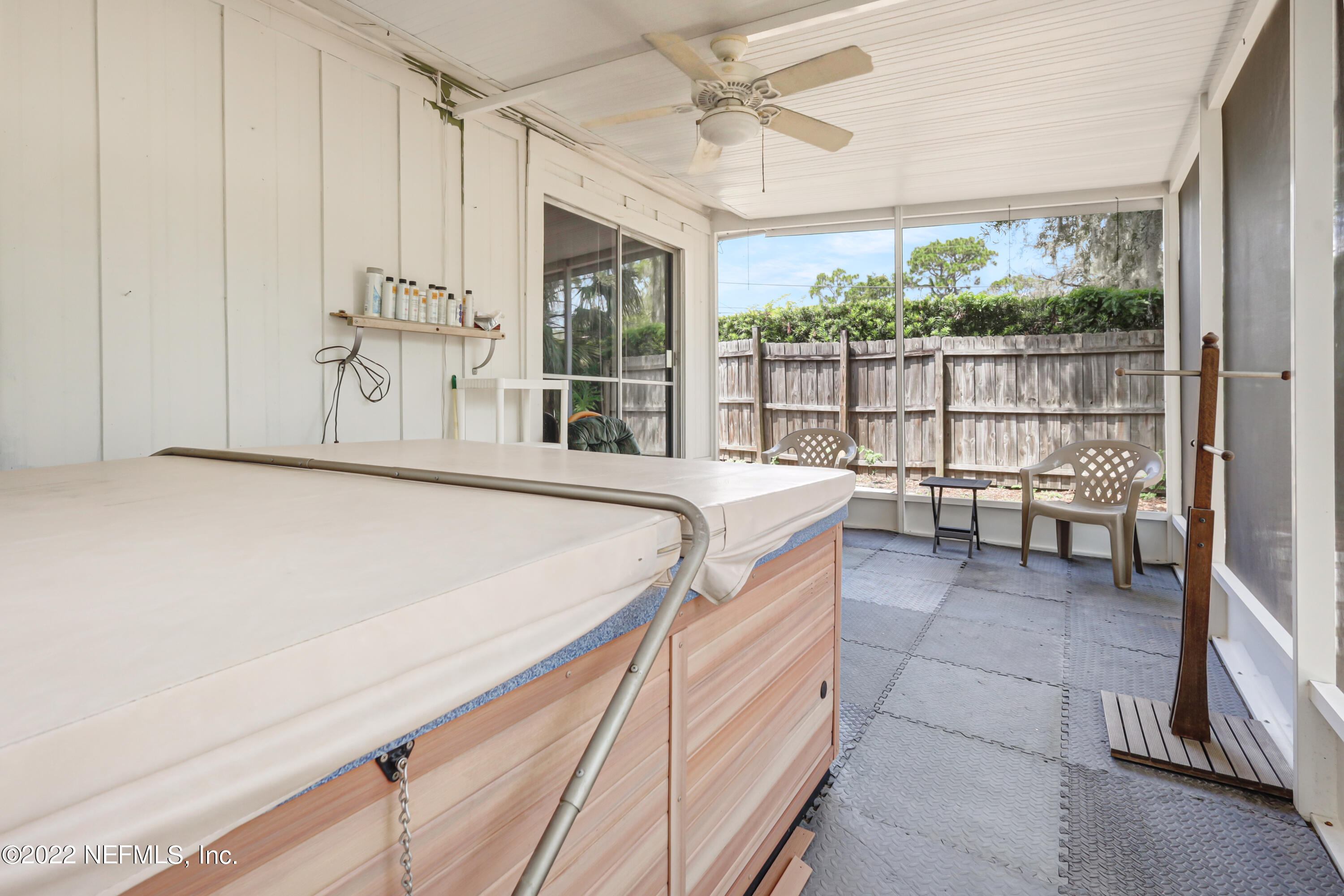3955 Heidi Road Jacksonville, FL 32277 - Photo 37 of 43 a room with a bed and a table