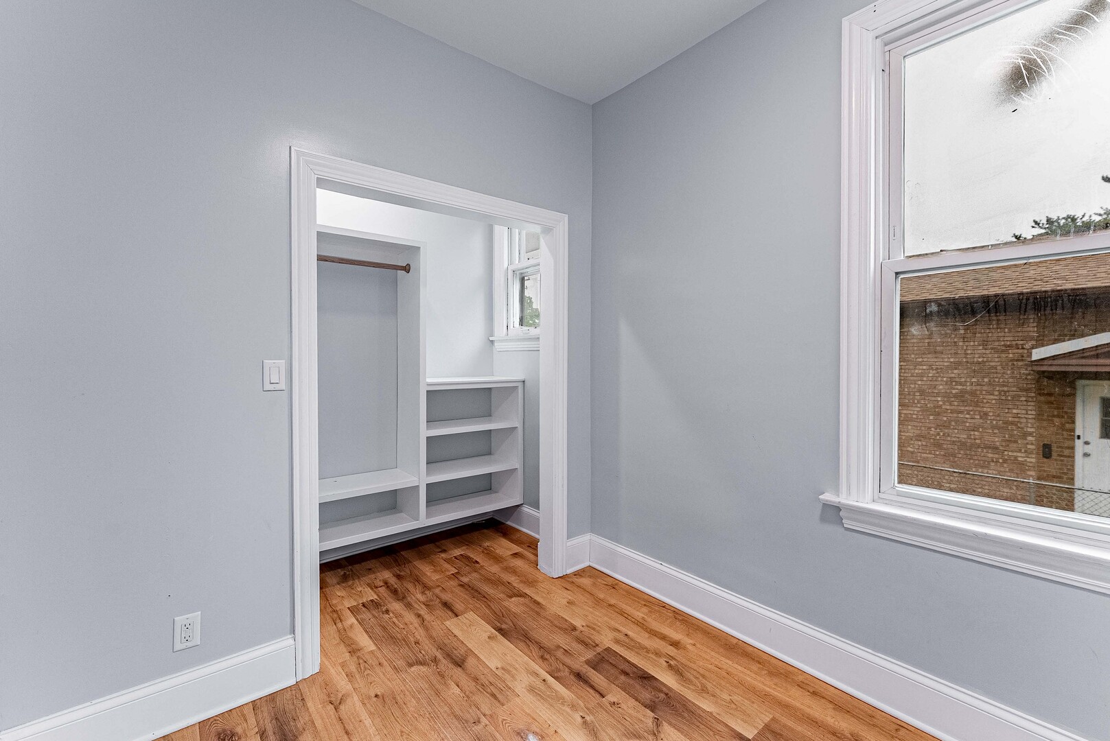 1330 Ridgeland Avenue Berwyn, IL 60402 - Photo 5 of 23 a view of wooden floor and windows in a room