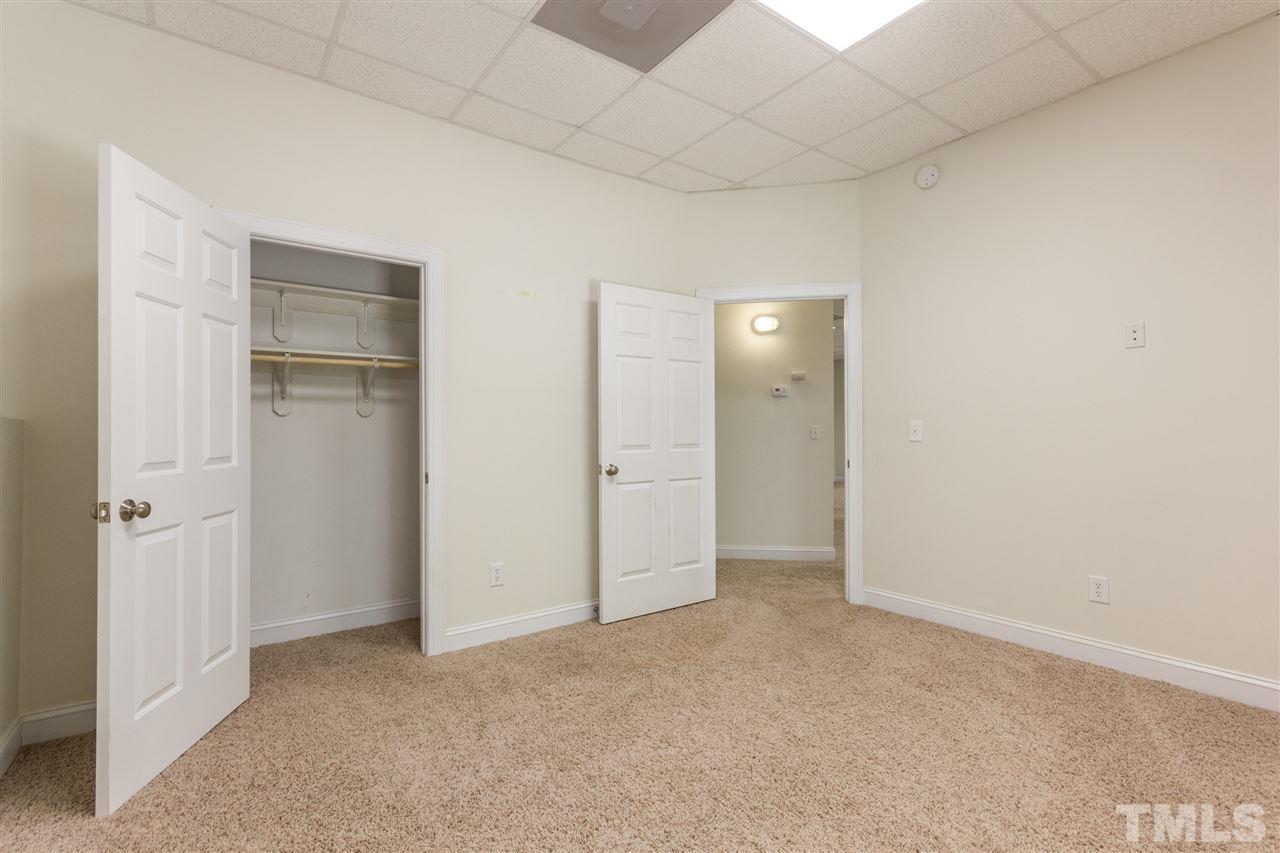 12104 McBride Drive Raleigh, NC 27613 - Photo 22 of 24 an empty room with closet area